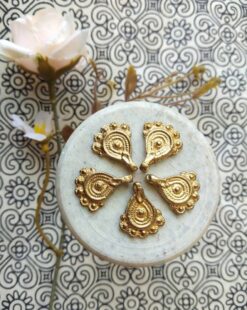 Handmade raw brass charms detail