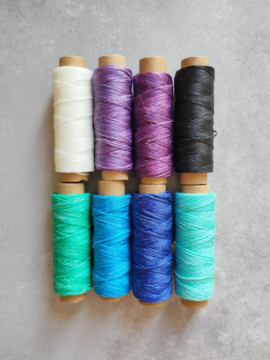 Galaxy-inspired 1mm waxed cord – vibrant black, purple, blue and turquoise colors