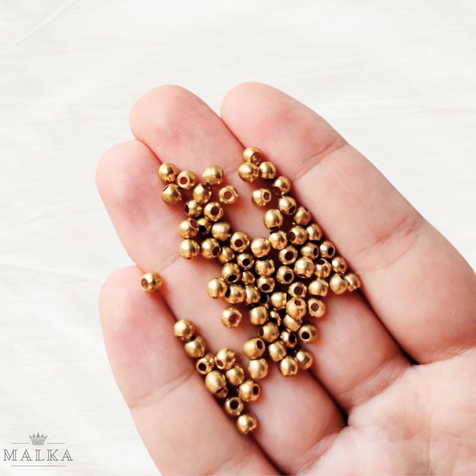 Wholesale jewelry DIY brass beads 4mm for earrings, bracelets, and macrame