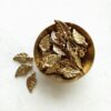 Leaves charms – Intricate leaf-shaped brass charms.