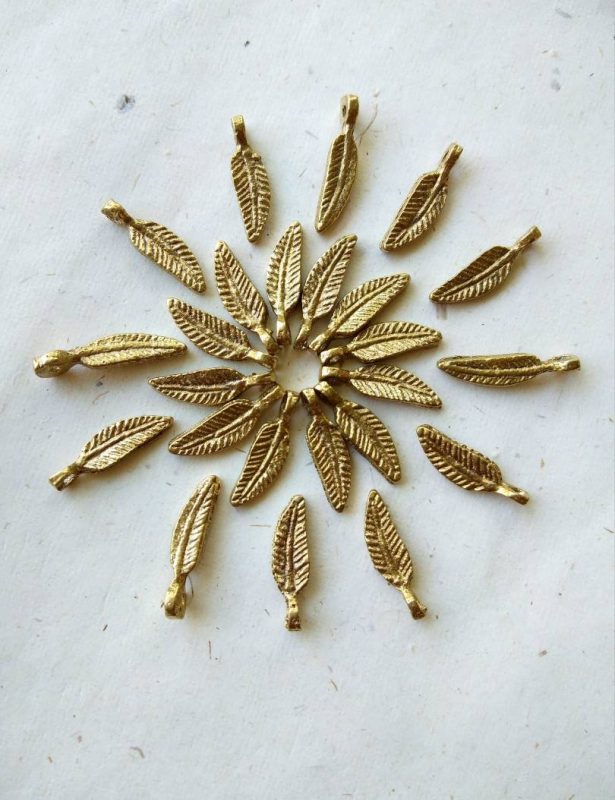 Mini feather charms – Handcrafted brass feather details.